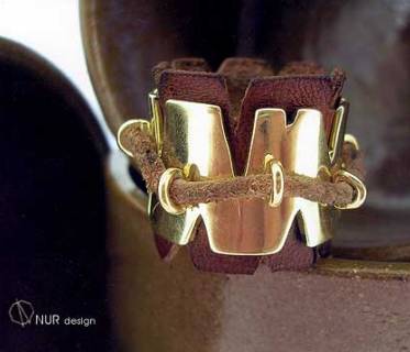 Ring with gold, leather and rope