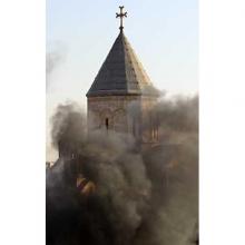 IRAQI CHURCH AND FIRE FLAMES