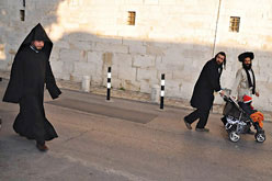 Ultra-Orthodox spitting attacks on Old City clergymen becoming daily