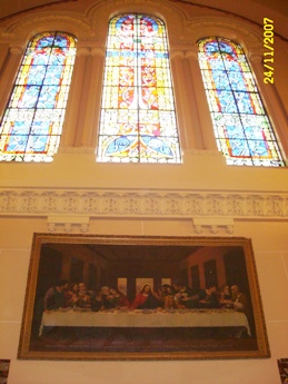 Side windows and picture of the Divine Supper