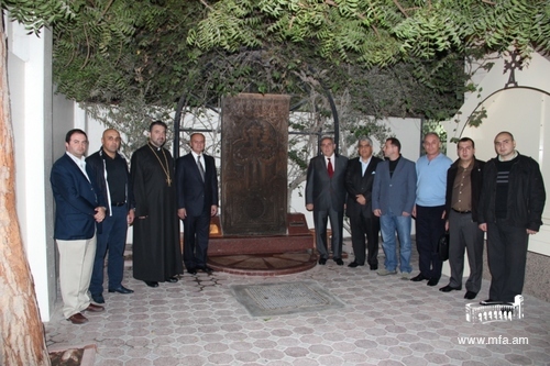 In front of the Armenian Genocide stone-cross monument